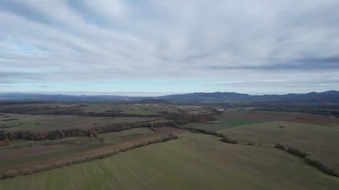 Sudety mountains, sky, clouds, farmfields, day, aerial drone footage Stock Footage 256339602