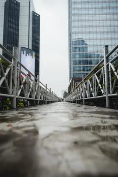 Sudirman pedestrian bridge is empty because after the rain Stock Photos