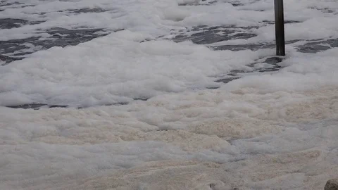 Suds and foam on the surface of a river. 4K Stock Footage 81073970