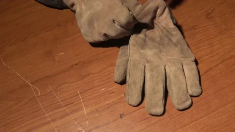 Suede glovees Stock Footage 220695898