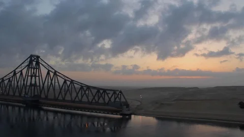 Suez Canal Transit - El Ferdan Railway Bridge at Sunrise (Ismailia, Egypt) 스톡 동영상 105043530