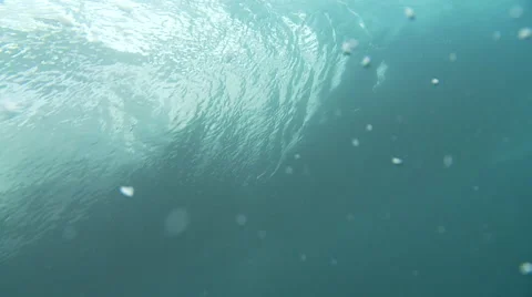 Sufer riding a barrel under water shot Video stock 44187483