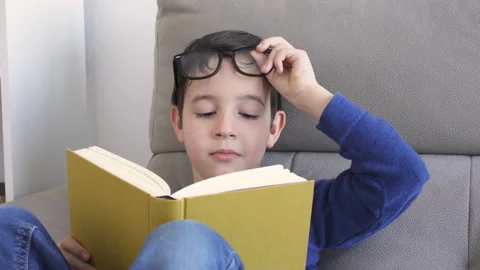 Suffering eye strain trying to read Video stock 250178516