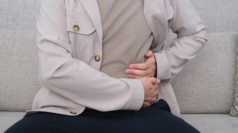 Suffering from side back pain Stock Footage 270944917