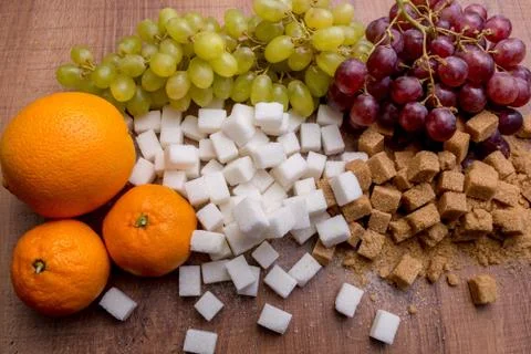 Sugar and fruit Stock Photos