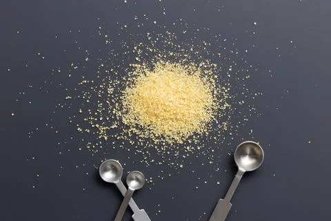 Sugar and spoons Stock Photos