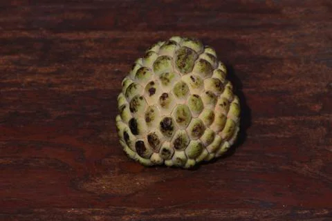 Sugar apple is lying on a table Stock Photos