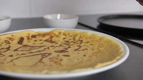 Sugar balls on a cooked crepe Stock Footage 201867203