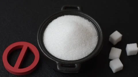 The sugar ban sign as a concept to stop the problem of diabetes and obesity. The Stock Footage 336977131