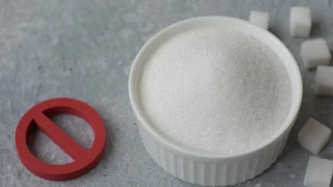 The sugar ban sign as a concept to stop the problem of diabetes and obesity. The Stock Footage 336977165