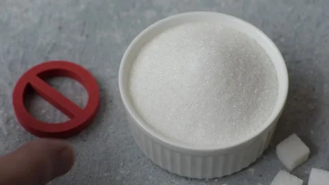 The sugar ban sign as a concept to stop the problem of diabetes and obesity. The Stock Footage 336977168