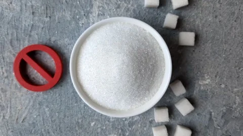 The sugar ban sign as a concept to stop the problem of diabetes and obesity. The Stock Footage 336977452