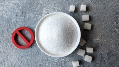 The sugar ban sign as a concept to stop the problem of diabetes and obesity. The Stock Footage 336977459