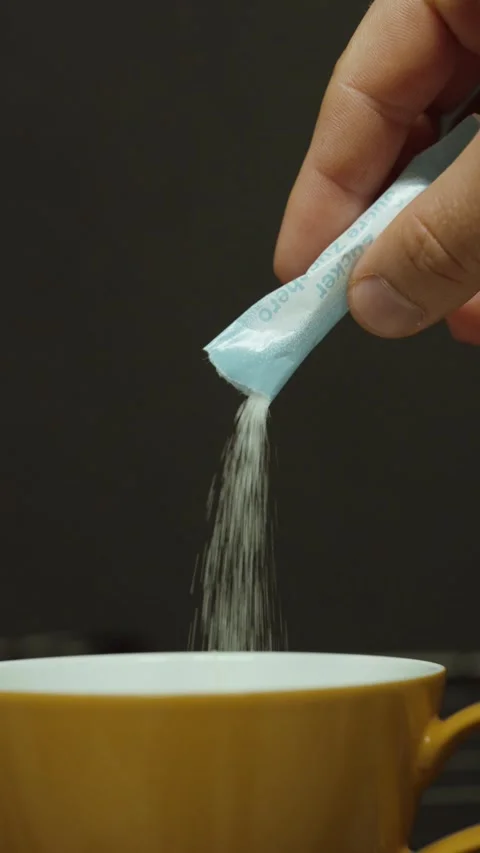 Sugar being poured into cup Video stock 335967223