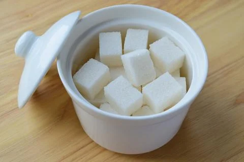 Sugar bowl with sugar Stock Photos