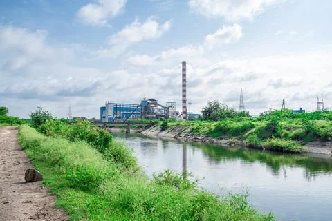 A sugar cane mill is a factory that processes sugar cane to produce raw sug.. Stock Photos