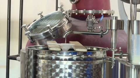Sugar cane rum process at the Takamaka rum distillery, distillation process Stock Footage 332947626