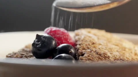 Sugar on cereal Stock Footage 23896646