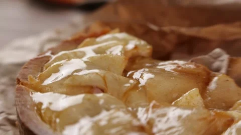 Sugar covering delicious fruit pie Stock Footage 136671364