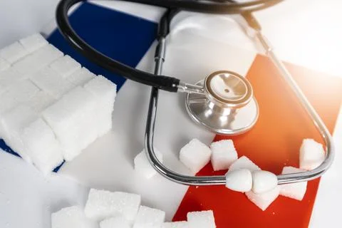 Sugar cube background image with medical stethoscope and healthcare in France Stock Photos