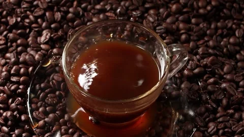 Sugar Cube Falling into Glass Coffee Cup Slow Motion Stock Footage 340302681