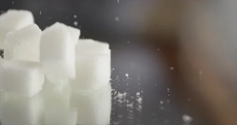 Sugar cube falls on a mirror surface Video stock 197702551