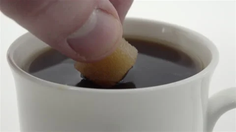 Sugar cube tossed in coffee cup. 4K UHD Stock Footage 48872078