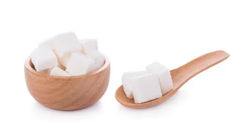 Sugar cube on white background Photos
