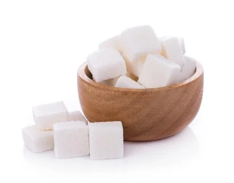 Sugar cube on white background Photos