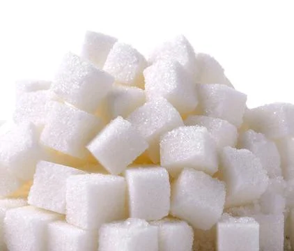Sugar cube on white background Stock Photos