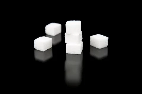 Sugar Cubes with Black Background Stock Photos