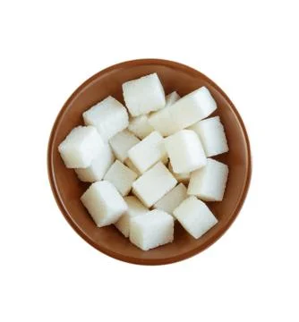 Sugar cubes in bowl Stock Photos