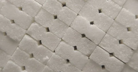 Sugar cubes close up studio shot over rotating Video stock 334257169
