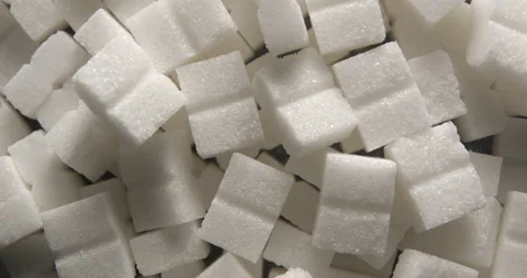 Sugar cubes close up studio shot over rotating Video stock 334257329