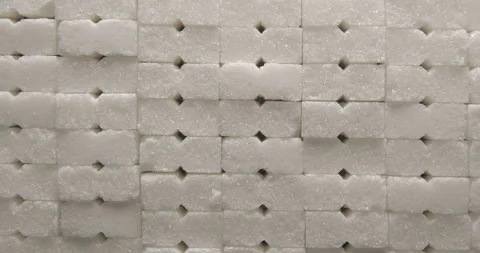 Sugar cubes close up studio shot over rotating Video stock 334257337