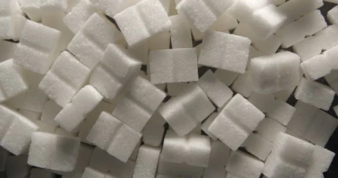 Sugar cubes close up studio shot over rotating Video stock 334257605