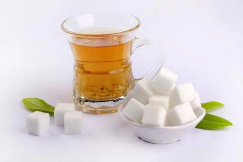 Sugar cubes. Cube sugar background, Sugar cubes in white bowl. Stock Photos