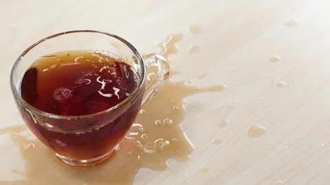 Sugar Cubes Dropping into Glass Cup of Black Tea Stock Footage 345767915