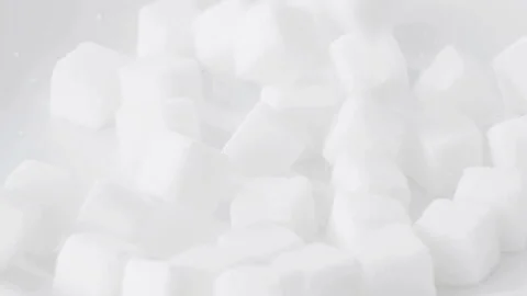 Sugar Cubes Falling on a Plate Stock Footage 327407621