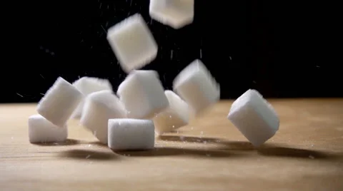 Sugar cubes falling in slow motion Stock-Footage 61738056
