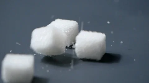 Sugar cubes falling in slow motion Stock Footage 113595567