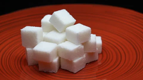 Sugar Cubes on a Red Plate Rotating Stock Footage 59949401