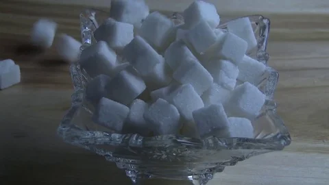 Sugar cubes. Sugar cubes falls in the sash 스톡 동영상 78232369