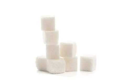 .Sugar cubes on white background isolated Stock Photos