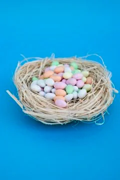 Sugar eggs in Easter nest Stock Photos
