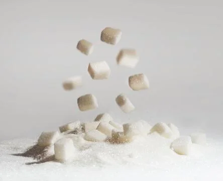 Sugar is falling down Stock Photos