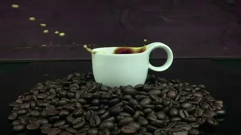 Sugar falling in slow motion inside of cup of espresso italian coffee Stock Footage 74758505