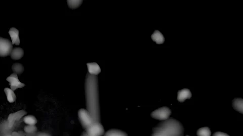 Sugar falling on the table in dark studio. Slowmotion, 180 fps shot Video stock 86284410