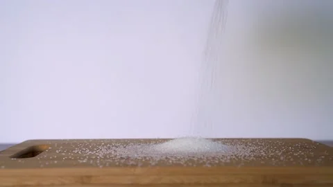 Sugar falls on a board Video stock 168465671