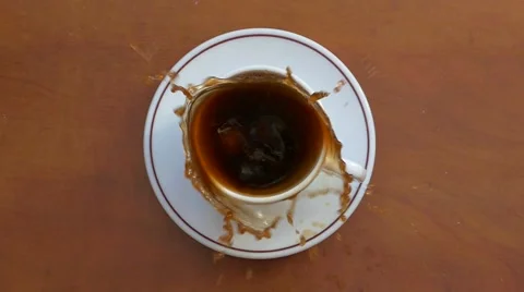 Sugar falls in a cup of coffee Stock Footage 46976355